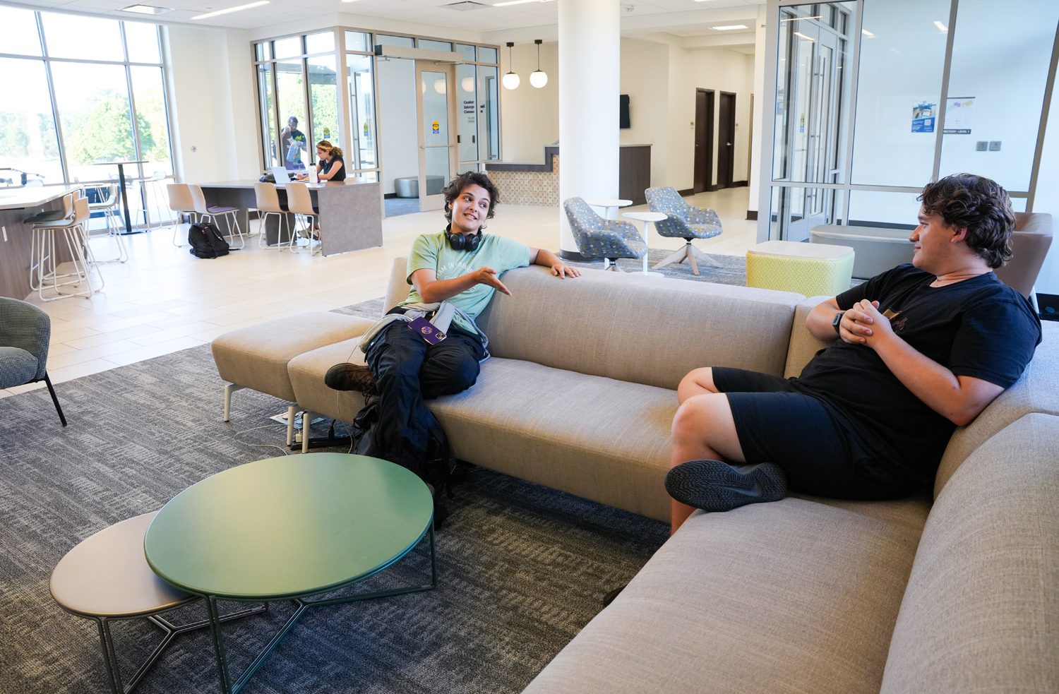 Sabe Roberson ’28 and Evan Beasley ’28 talk in the lounge area on the bottom floor of Lakeview Hall on Thursday evening, September 5, 2024. Photo by Nathan Gray, Furman University.