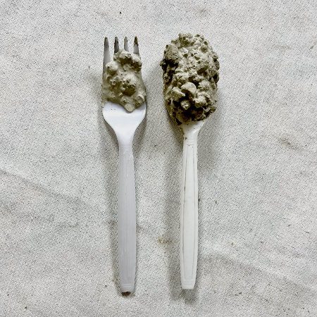 utensils on fabric containing questionable food stuffs