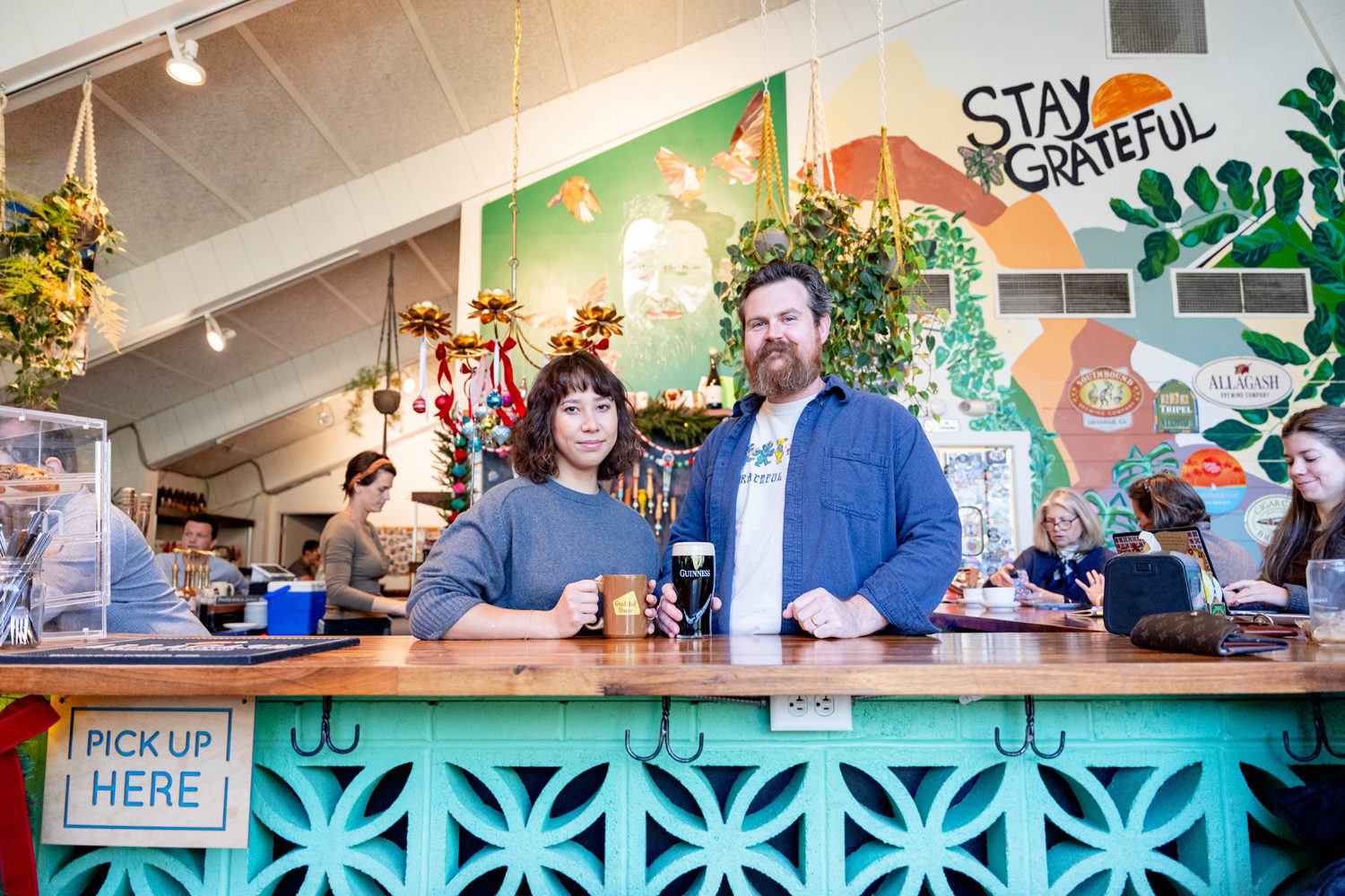 Deb York ’14, left, vice president of Grateful Brew with George Linn, president of Grateful Brew. Photo by Owen Withycombe.
