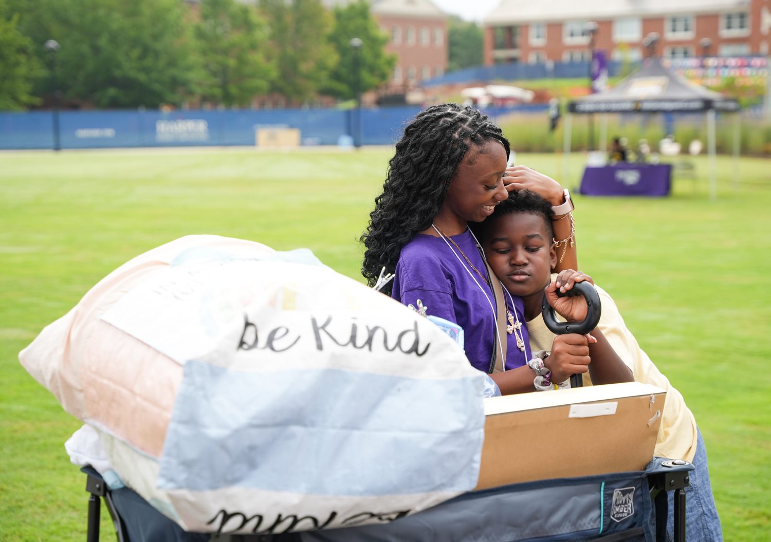 Ciara Whitfield ’29, hugs her nephew while moving into Blackwell Hall on Thursday, Aug. 21, 2025.