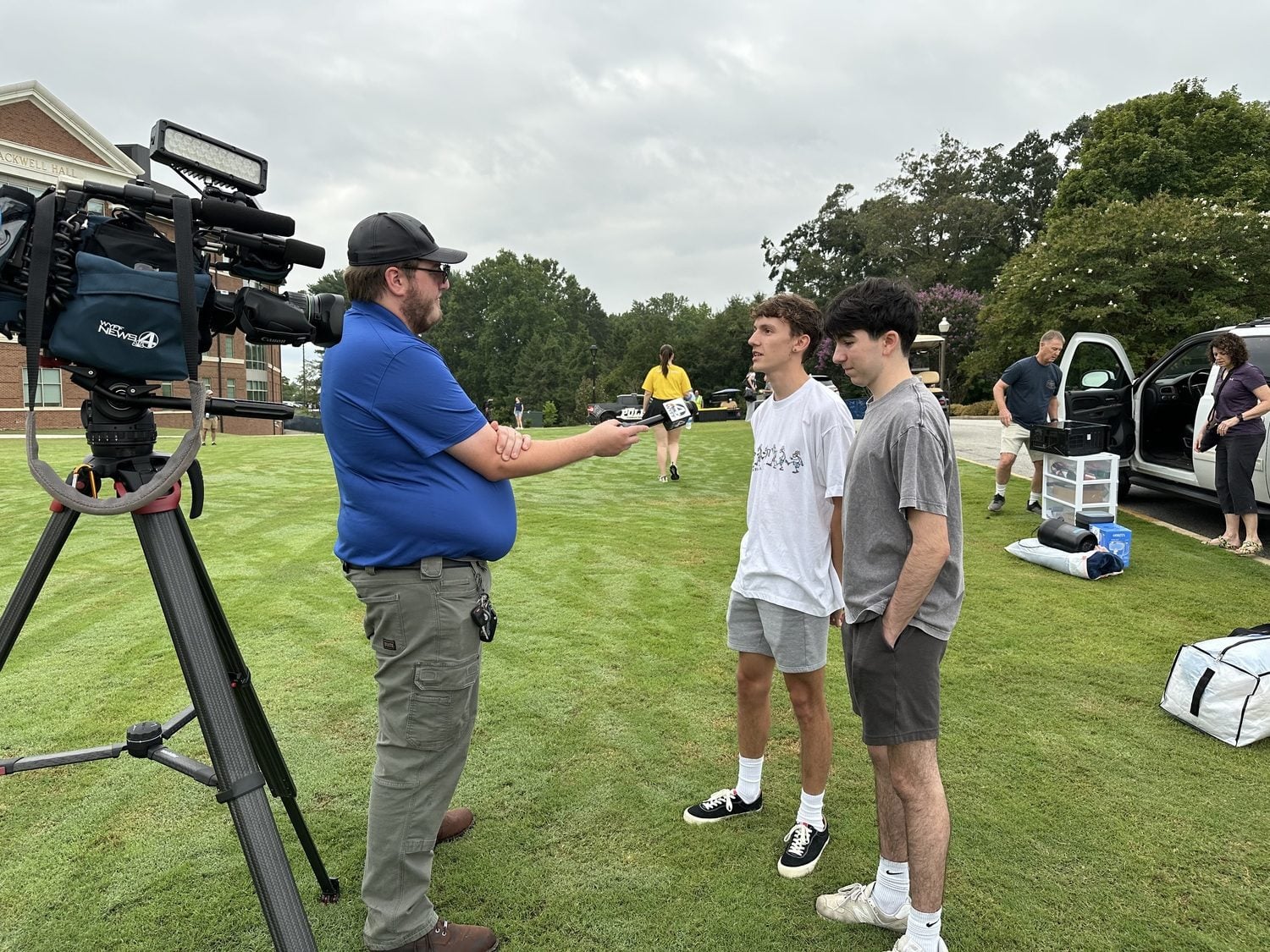 Roommates Jonah Austin '29 from Lake Charles, Louisiana, and Jacob Lawson '29 from Washington D.C., talk with a reporter on move-in day, Thursday, Aug. 21, 2025. Photo by Clinton Colmenares, Furman University.