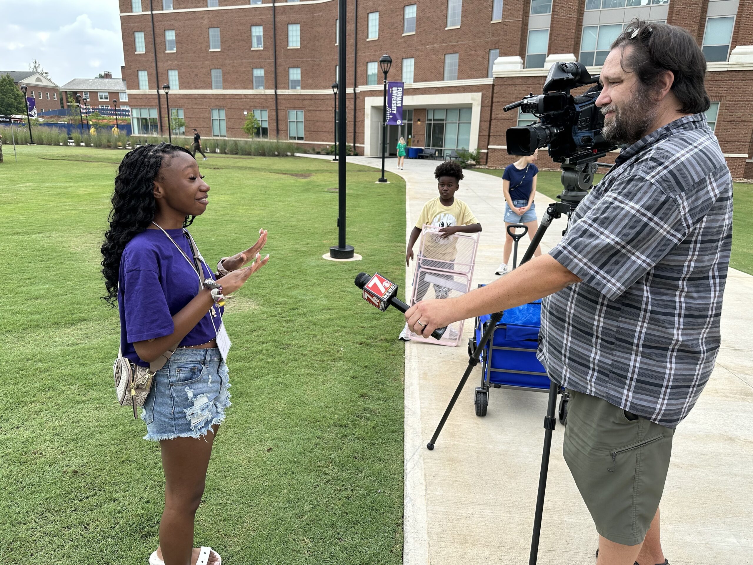 Ciara Whitfield '29, from Charleston, South Carolina, talks with a reporter on move-in day, Thursday, Aug. 21, 2025. Photo by Clinton Colmenares, Furman University.