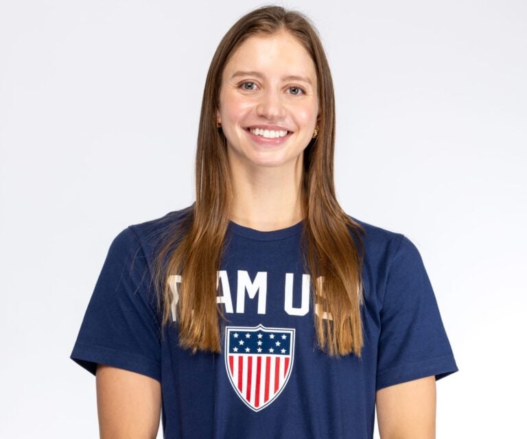 A portrait of a smiling woman