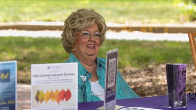 Nancy Cooper, Furman’s coordinator for volunteer services, talks with students at the Campus and Community Connections Fair.