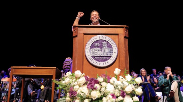 Joshua Swope ’23, president of the Student Government Association, at the podium during Opening Convocation.