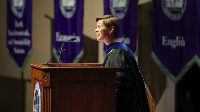 Michelle Horhota, associate dean for mentoring and advising and professor of psychology, delivers the address.