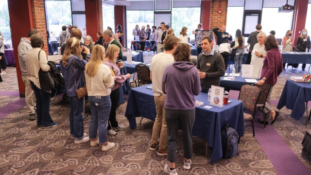 Students and their families learn about opportunities from the Center for Engaged Learning.