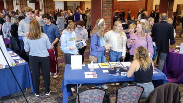 Students and their families learn about opportunities from the Center for Engaged Learning during Family Weekend.