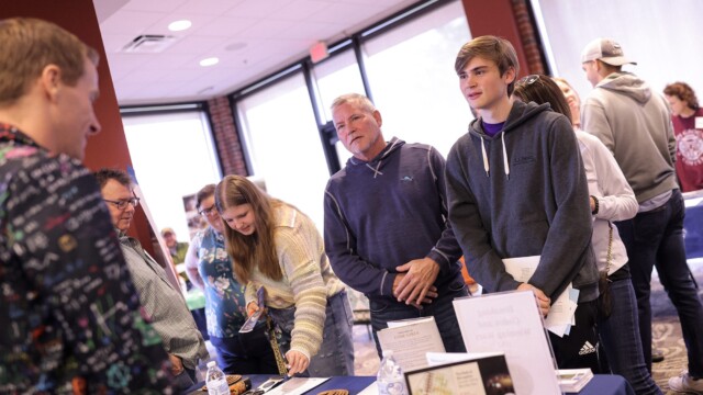 Stephen Smith and family learn about opportunities at Furman during Family Weekend.