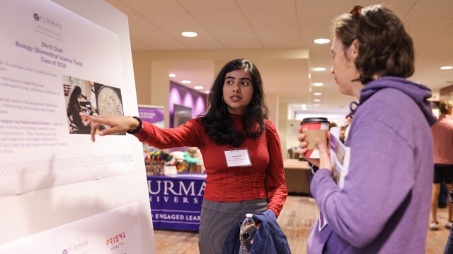 Dhriti Shah '23 presents her biology research project.