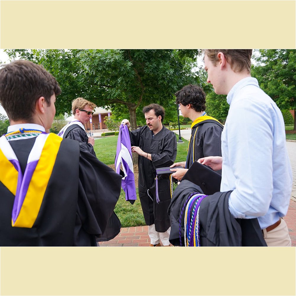 Students gather at McAlister Auditorium to prepare for the procession down Furman Mall into Paladin Stadium as the May 6 Commencement ceremony begins.
