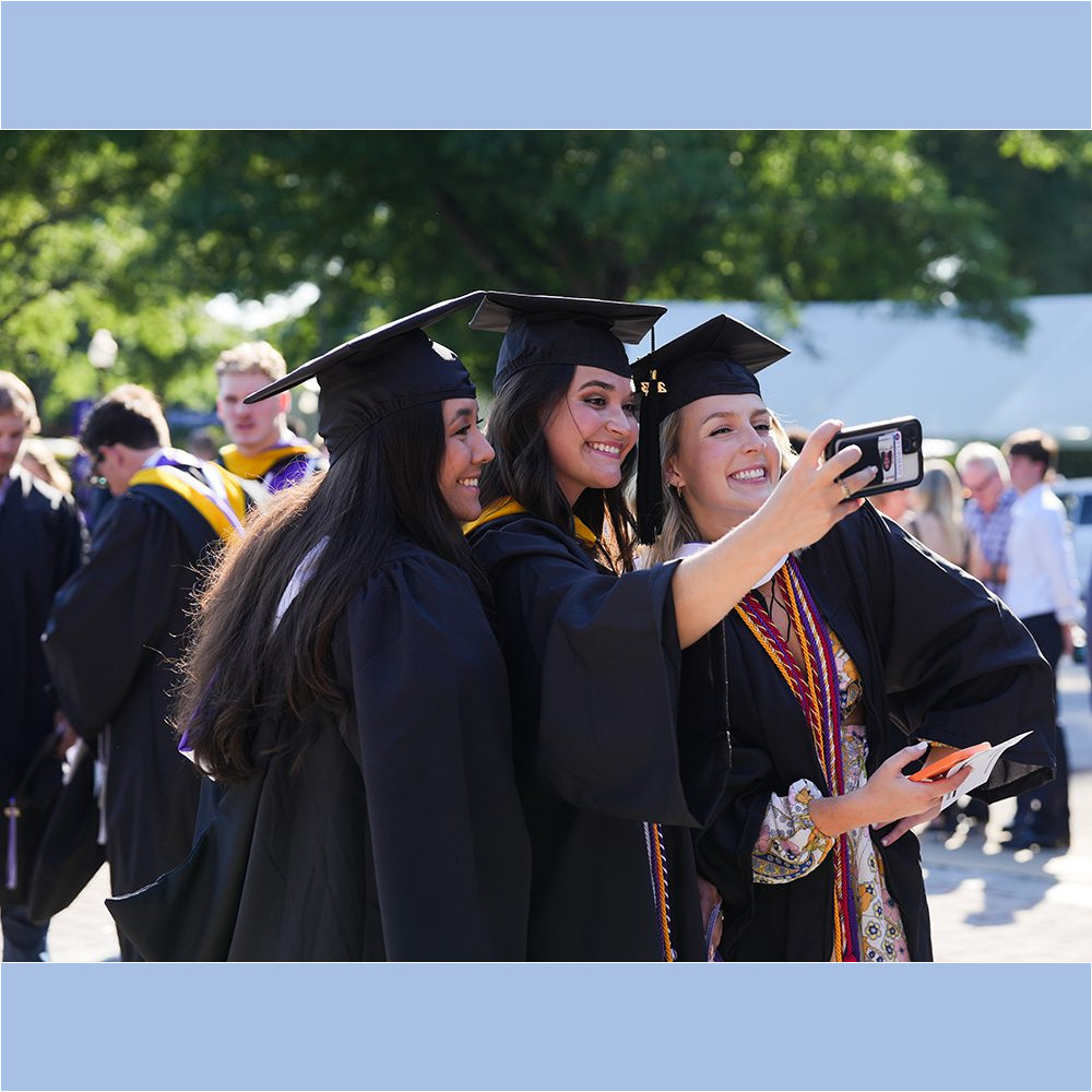 Students gather at McAlister Auditorium to prepare for the procession down Furman Mall into Paladin Stadium as the May 6 Commencement ceremony begins.