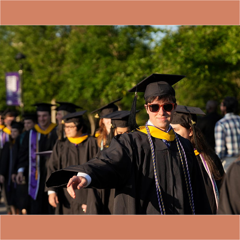 Members of the Class of 2023 proceed up Furman Mall into Paladin Stadium at the beginning of the May 6 Commencement ceremony.