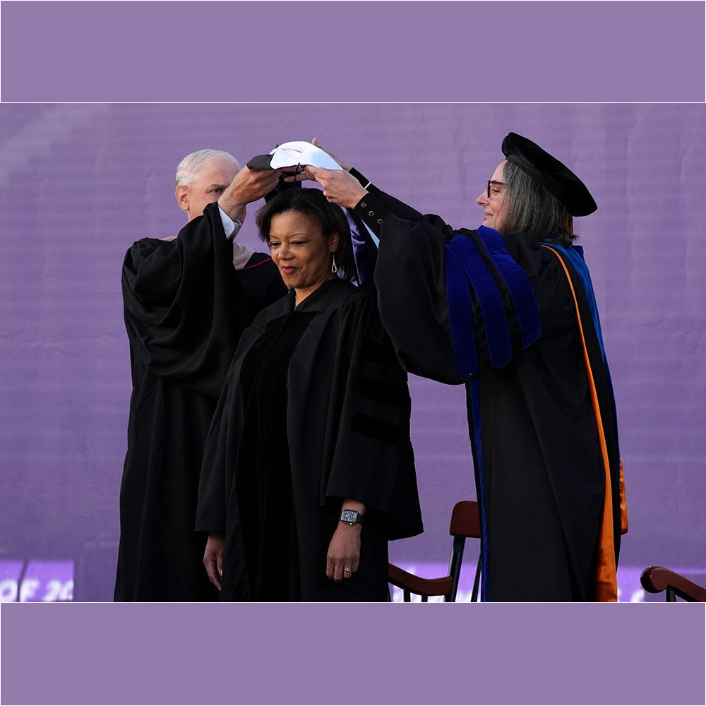 Tomiko Brown-Nagin ’92 (center) receives a doctoral hood from Board of Trustees Chair Kevin T. Byrne ’91 (left) and Interim Vice President for Academic Affairs and Provost Beth Pontari during the Commencement ceremony on May 6.