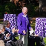 John Cothran ’54 stands to be recognized during a ceremony to unveil the Benefactors Green on Saturday, April 13, 2024.