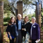 Raymond Newsom ’65, middle, and Carol Newsom ’66 stand with family members at their marker on the Benefactors Green on Saturday, April 13, 2024.