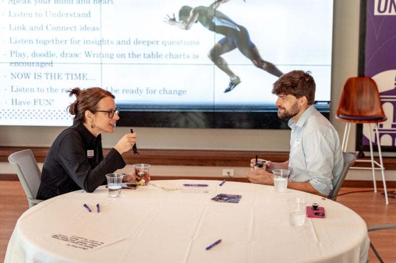 Two people discussing