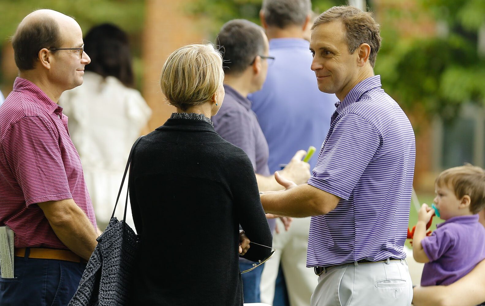 Parents chatting during the activities of Family Weekend