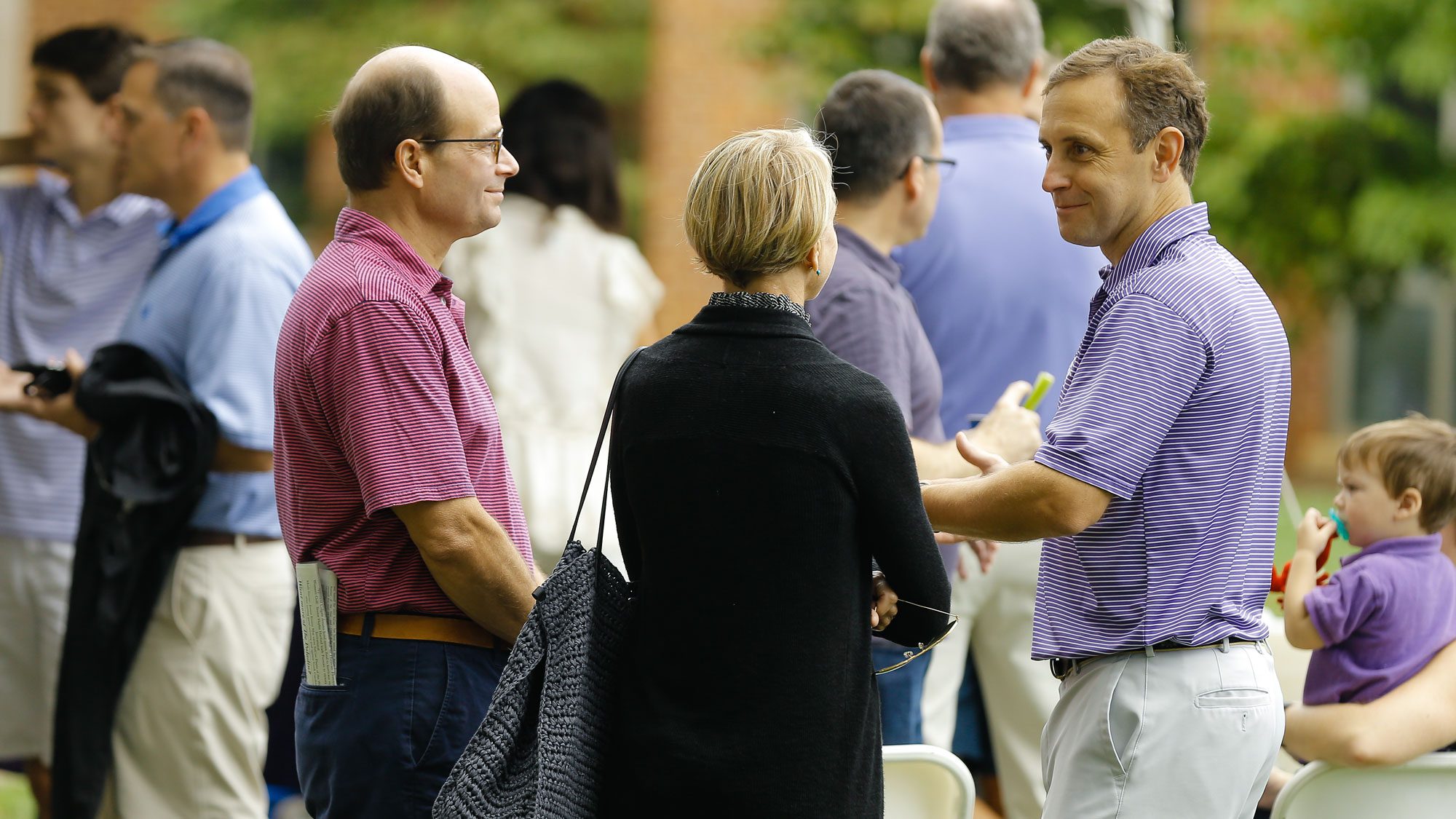 Parents chatting during the activities of Family Weekend