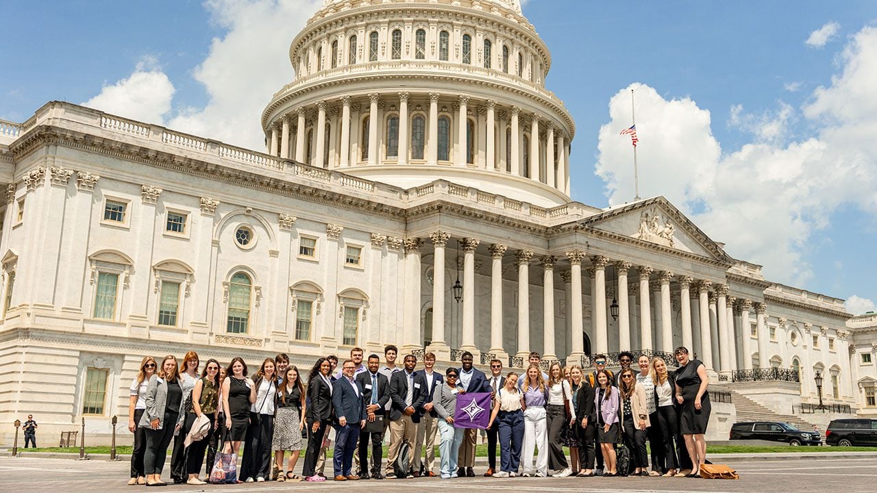 class photo in front of the capitol building