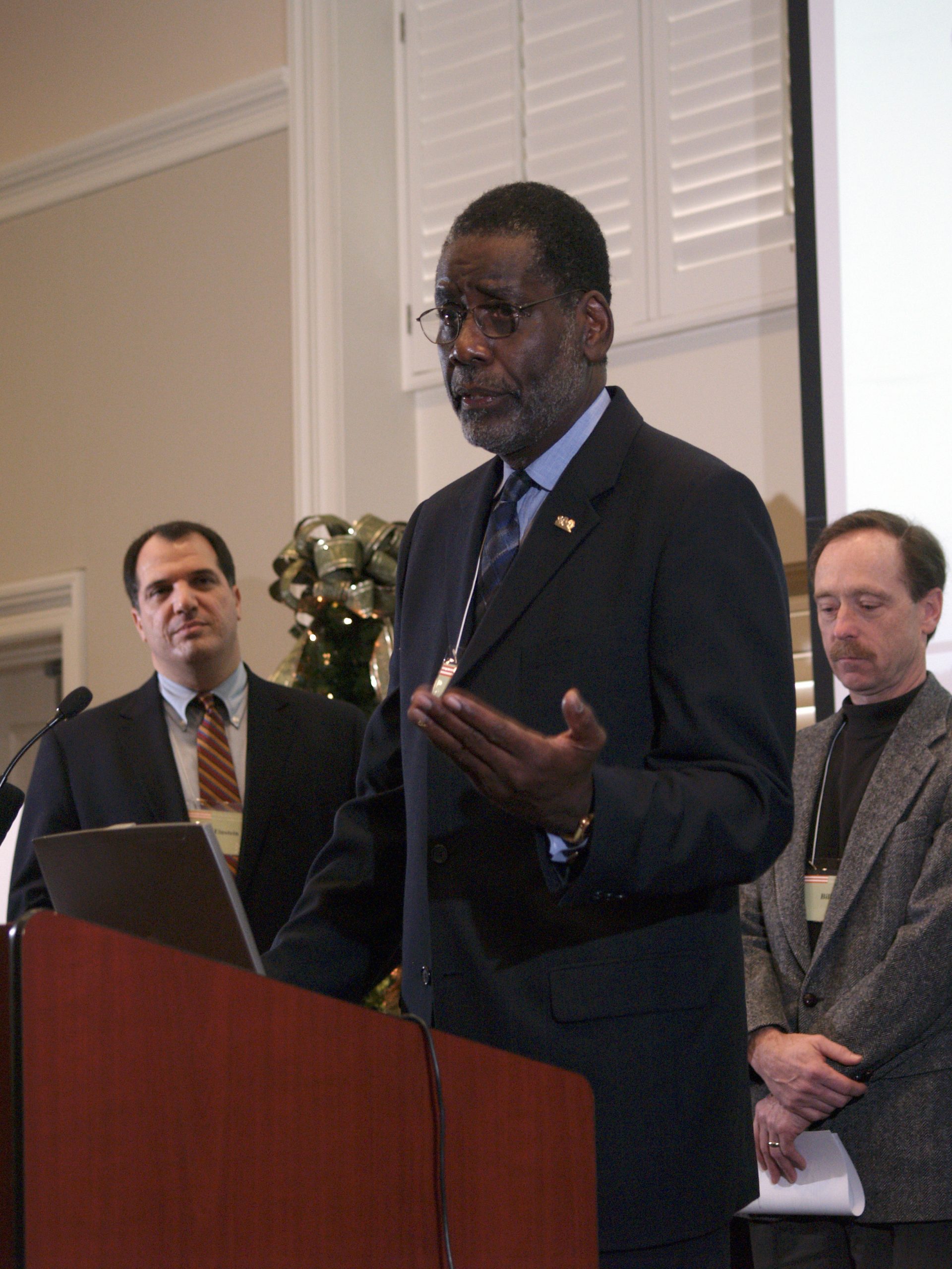 (l-r) Dan Einstein, Al Gray presenting and Bill Berg