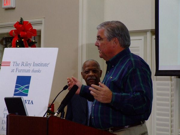 Doug Douglas presenting and Caesar Richburg