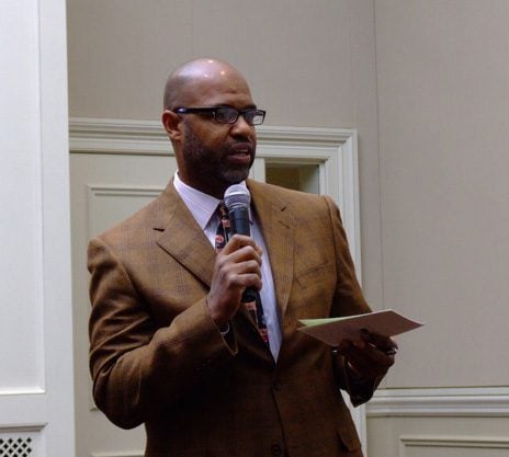 Juan Johnson, program facilitator and Riley Senior Associate, critiquing the public service projects