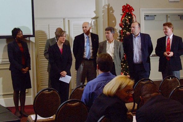 Responding to questions (l-r) Jessica Gilbert, Patricia Harrison, Karl Pendergrass, Bill Stephenson, Mike Daigle, John McLeod, and Harry Workman