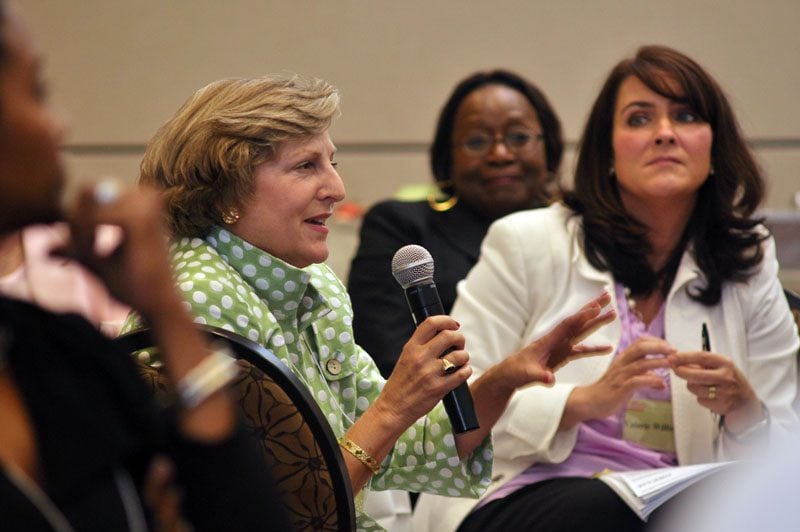 Renée Romberger posing a question to the group