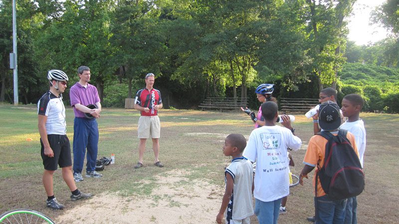 The Greenville Spinners giving additional instruction