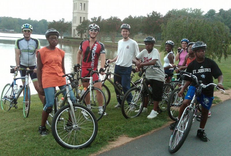 Posing by Furman's belltower
