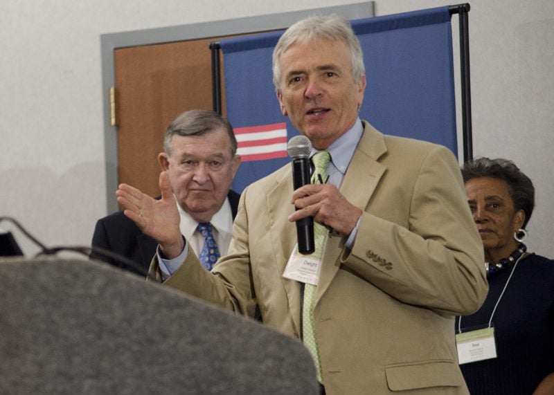 Dwight Stewart speaking, Bill Painter and Bea Rivers in the background, Know Difference