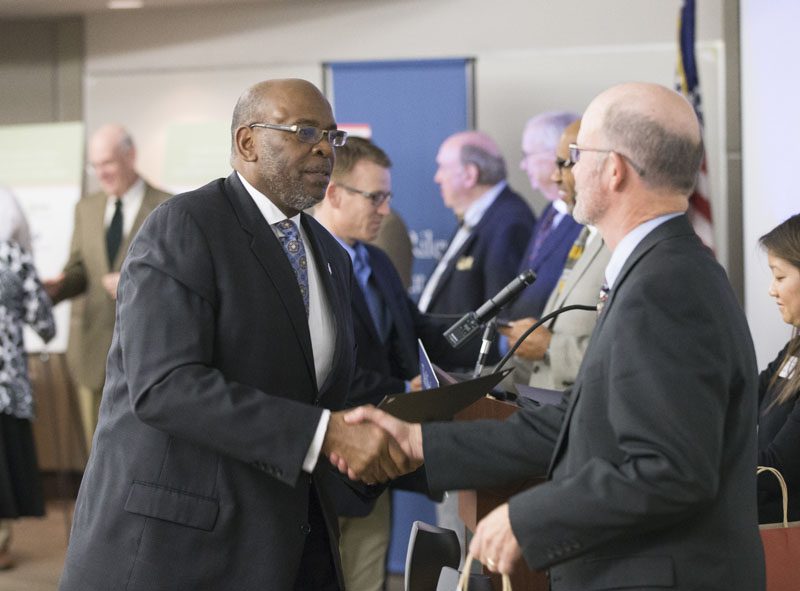Jonathan Holston, accepting his certificate, is now a Riley Fellow