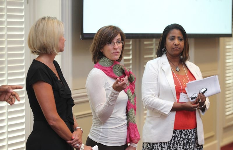 Kristy Caradori (center) along with Coby Hennecy and Michelle Hunt answer questions about the STEM Stars project.