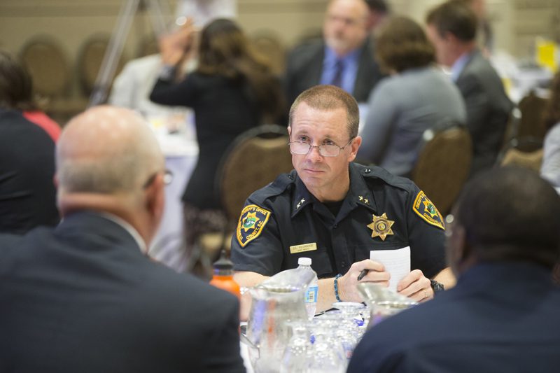 John Eldridge (center) with the team C.O.P.S., Changing Our Perspectives