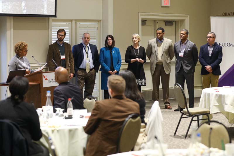 (l-r) Toni Land speaking, Rimes McElveen, Danny Merck, Traci Hogan, Stacey Bechtold, Will Whitley, Cherod Webber and Marty Herndon, Swamp Rabbit Express