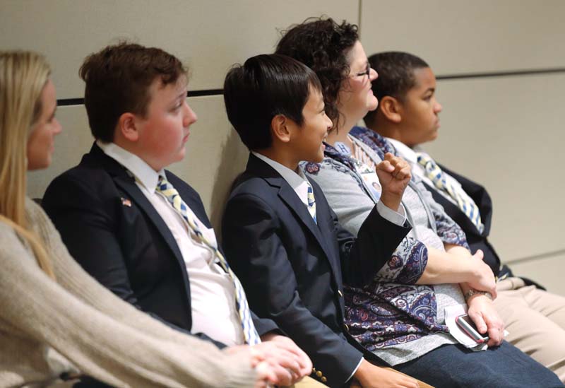 Students from Monaview Elementary School’s Men Who Read program, Leaders for Literacy