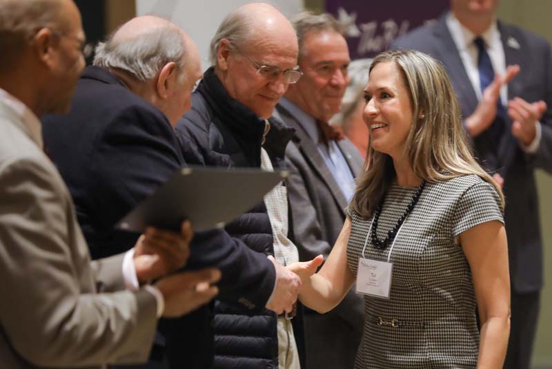 Tui Allen, Career Academy, in line to receive her Riley Fellow certificate from Juan Johnson