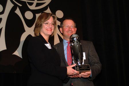 Jim Micali presenting the Outstanding Contribution to International Diversity Award to Patricia Harrison from The International Center of the Upstate