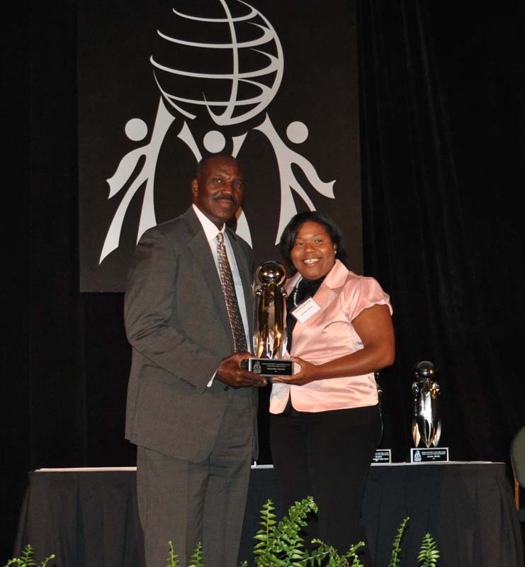 Jemeka Harris, a Furman University student, was the recipient of the Outstanding College Student award. Clarence Kegler, Chief Diversity Office with Michelin North America, presented the award to her.
