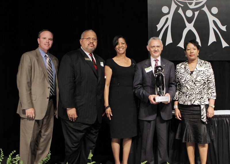 The Outstanding Non-Profit Organization award was presented to Spartanburg School District Seven by Sky Foster, BMW Manufacturing Co