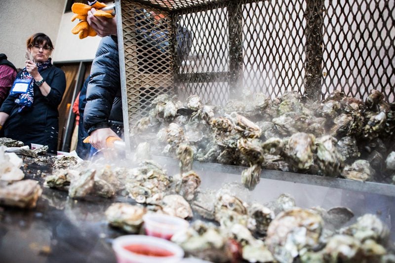Judy Romano looking on as more steamed oysters are ready to eat