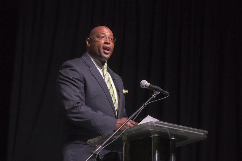 Reverend Darien Blue, Senior Pastor at Nicholtown Missionary Baptist Church and DLI graduate - Class XVIII, delivering the invocation.