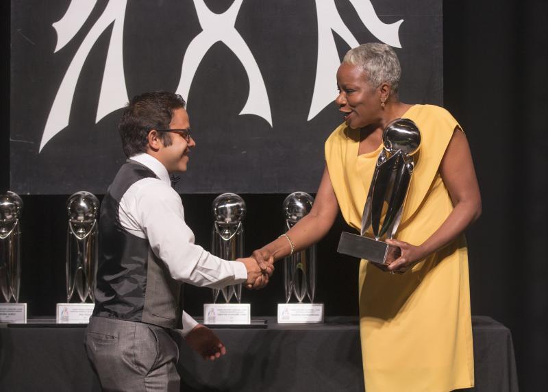 Carlos Pineda receiving the Outstanding High School Student. Carlos is a junior at Mauldin High School and a student leader in Bridges to a Brighter Future.