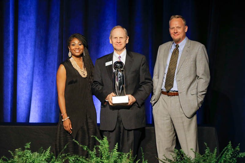 (l-r) Nika White, Baxter Wynn accepting the award for Dr. Jim Dant and Jacob Ehrmann