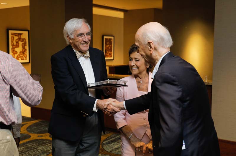 Secretary Riley congratulating Bob Saul, who accepted the award for the Center for Pediatric Medicine, GHS Children's Hospital