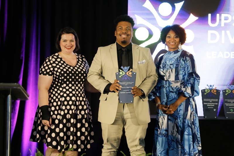 The Outstanding College Student Award was awarded to Antonio Harrison (c); award was presented by Upstate Chambers.