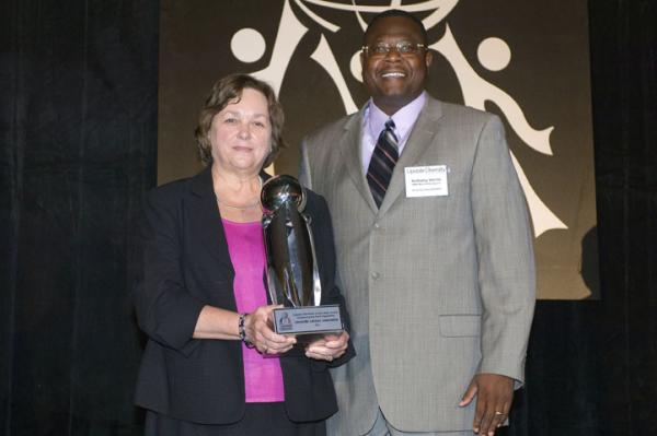 The Outstanding Non-Profit Award was awarded to the Greenville Literacy Association. Jane Thomas, Executive Director, accepted the award.