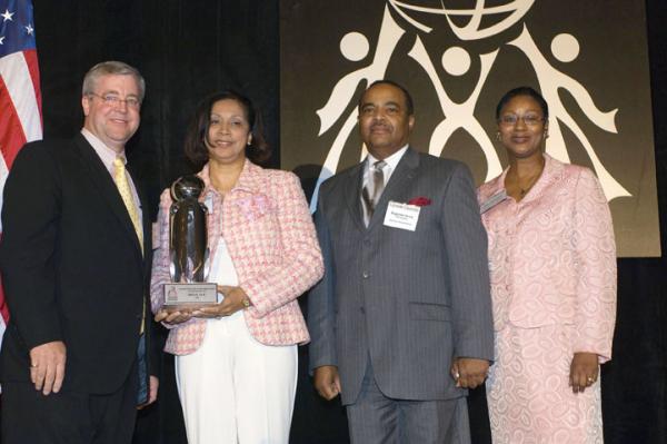 The Outstanding Business Award was presented to Bi-Lo, LLC by Reginald Avery, USC Upstate