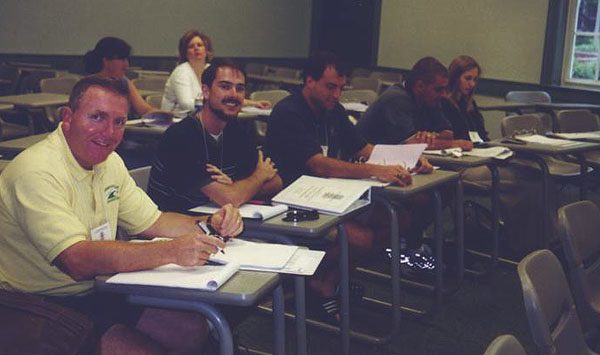 From left: Bobby Behr, Garrett Walker, Chris Burkett, Mike Burgess, Elizabeth Abramson, Laura Graham, Cynthia Capers in class at Furman